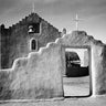 Canvas Art Print Full side view of entrance with gate to the right, Church, Taos Pueblo National Historic Landmark, N Photography subject by Bosch Hieronymus Fine Art Print quality 